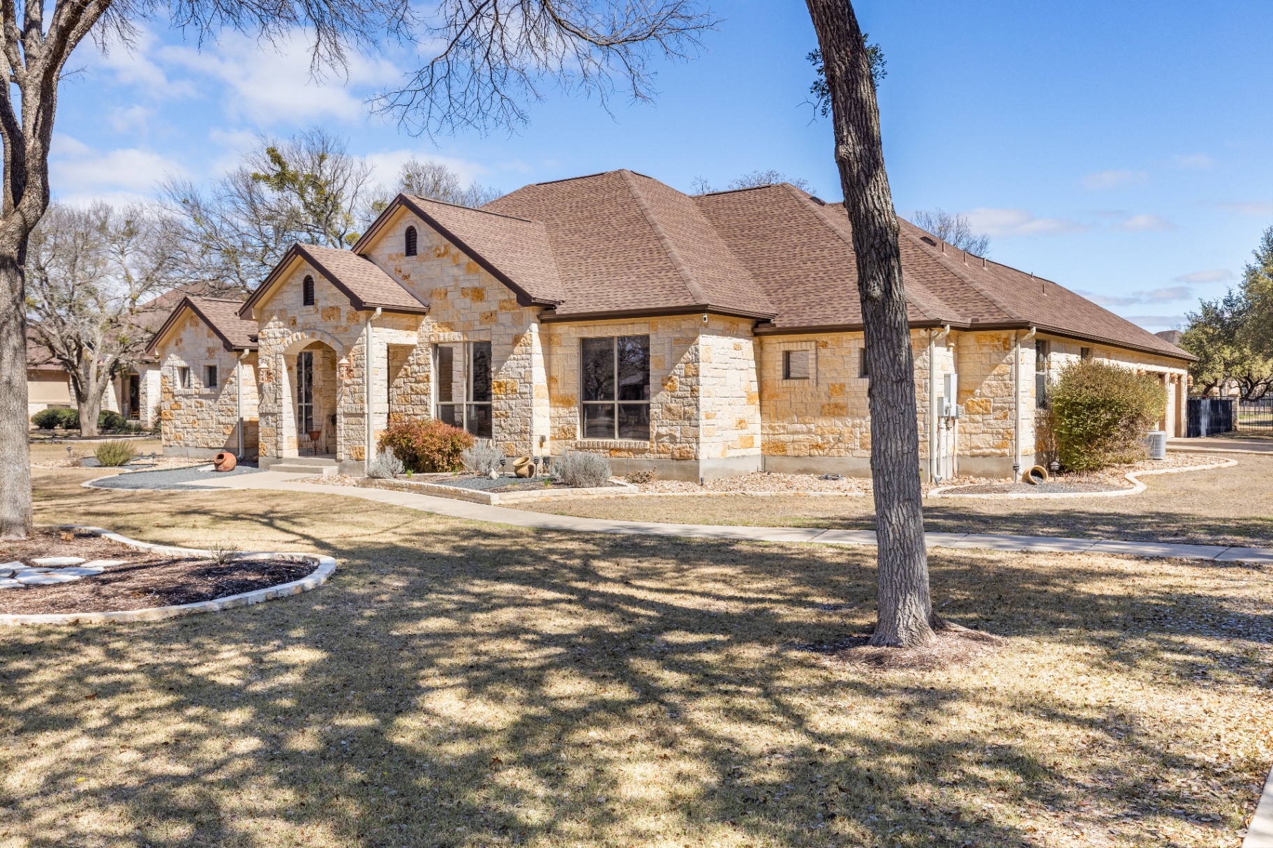Wide angle view of home showing full footprint on one acre lot